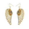 Nahua Anita Earrings - Gold  Handmade leather earrings, adorned with sequins and beads, in the shape of angel wings. 