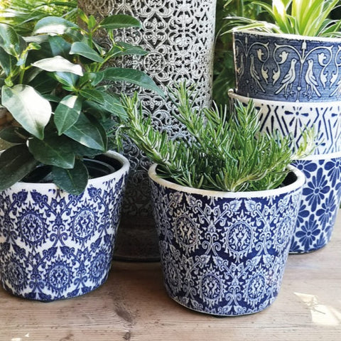 Mediterranean style rustic, hand-crafted terracotta pots inspired by vintage floor tiles 
