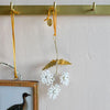 White Flower with Brass Leaves Hanging Decoration