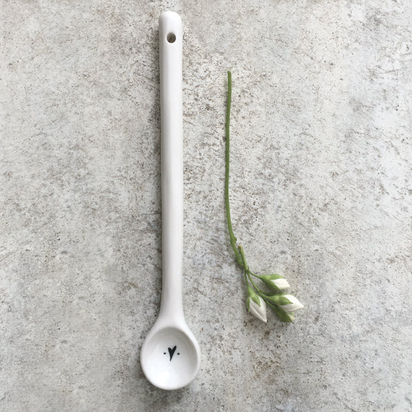 long porcelain spoon with heart design
