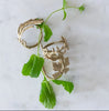 Set of six leaf brass coloured napkin rings