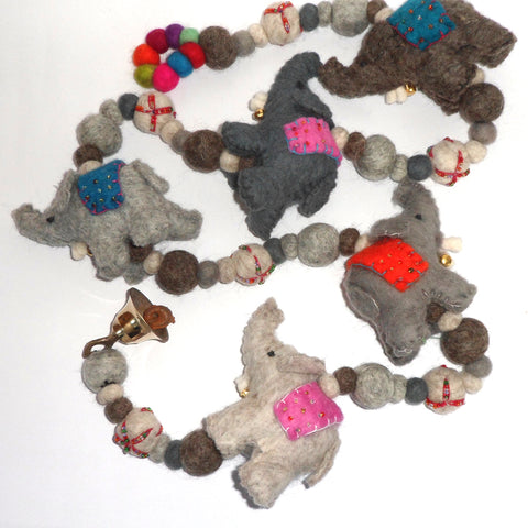 string of grey felt elephants fairtrade made in Nepal