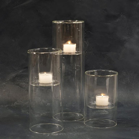 Cylindrical glass tealight or pillar candle holder