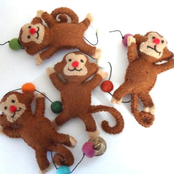 String of Four Felt monkeys made in Nepal Fairtrade