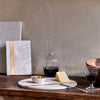 large white marble chopping cheese board with brass accent band