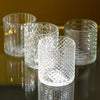 Set of four decorative glass tealight holders