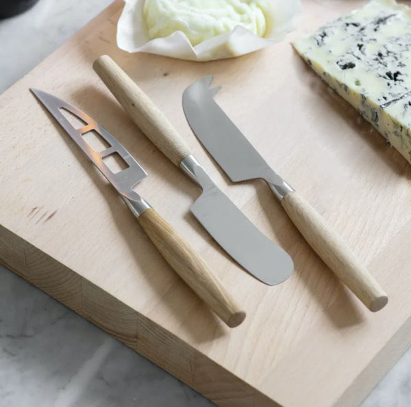 Set of three cheese knives with oak handle