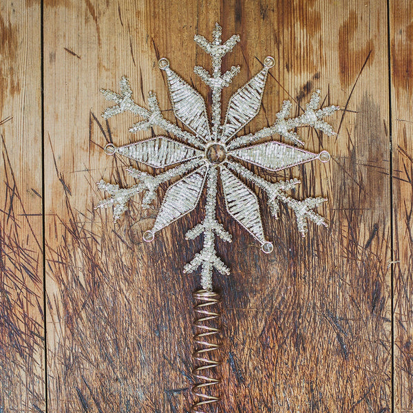 Silver bead snowflake tree topper with clear rhinestones